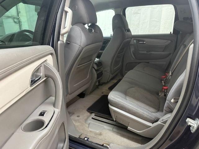 2015 Blue Chevrolet Traverse LS FWD w/PDC (1GNKRFEDXFJ) with an 3.6L V6 DOHC 24V engine, 6-Speed Automatic transmission, located at 1806 Veterans Memorial Hwy SW, Austell, GA, 30168, (770) 944-9558, 33.817959, -84.606987 - Photo#10