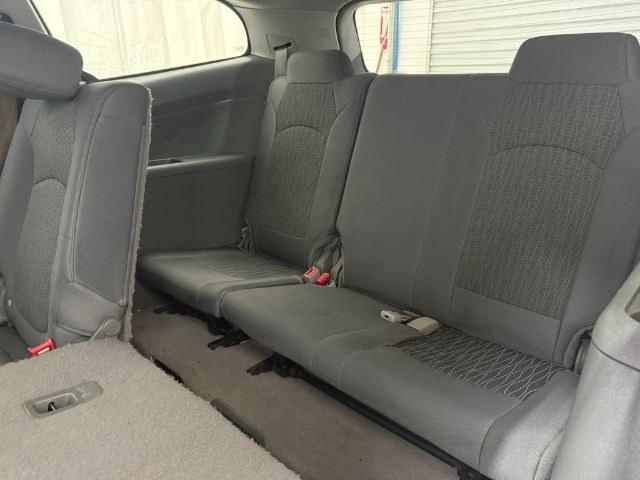 2015 Blue Chevrolet Traverse LS FWD w/PDC (1GNKRFEDXFJ) with an 3.6L V6 DOHC 24V engine, 6-Speed Automatic transmission, located at 1806 Veterans Memorial Hwy SW, Austell, GA, 30168, (770) 944-9558, 33.817959, -84.606987 - Photo#11