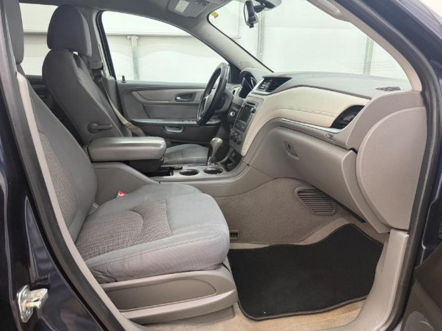 2015 Blue Chevrolet Traverse LS FWD w/PDC (1GNKRFEDXFJ) with an 3.6L V6 DOHC 24V engine, 6-Speed Automatic transmission, located at 1806 Veterans Memorial Hwy SW, Austell, GA, 30168, (770) 944-9558, 33.817959, -84.606987 - Photo#13