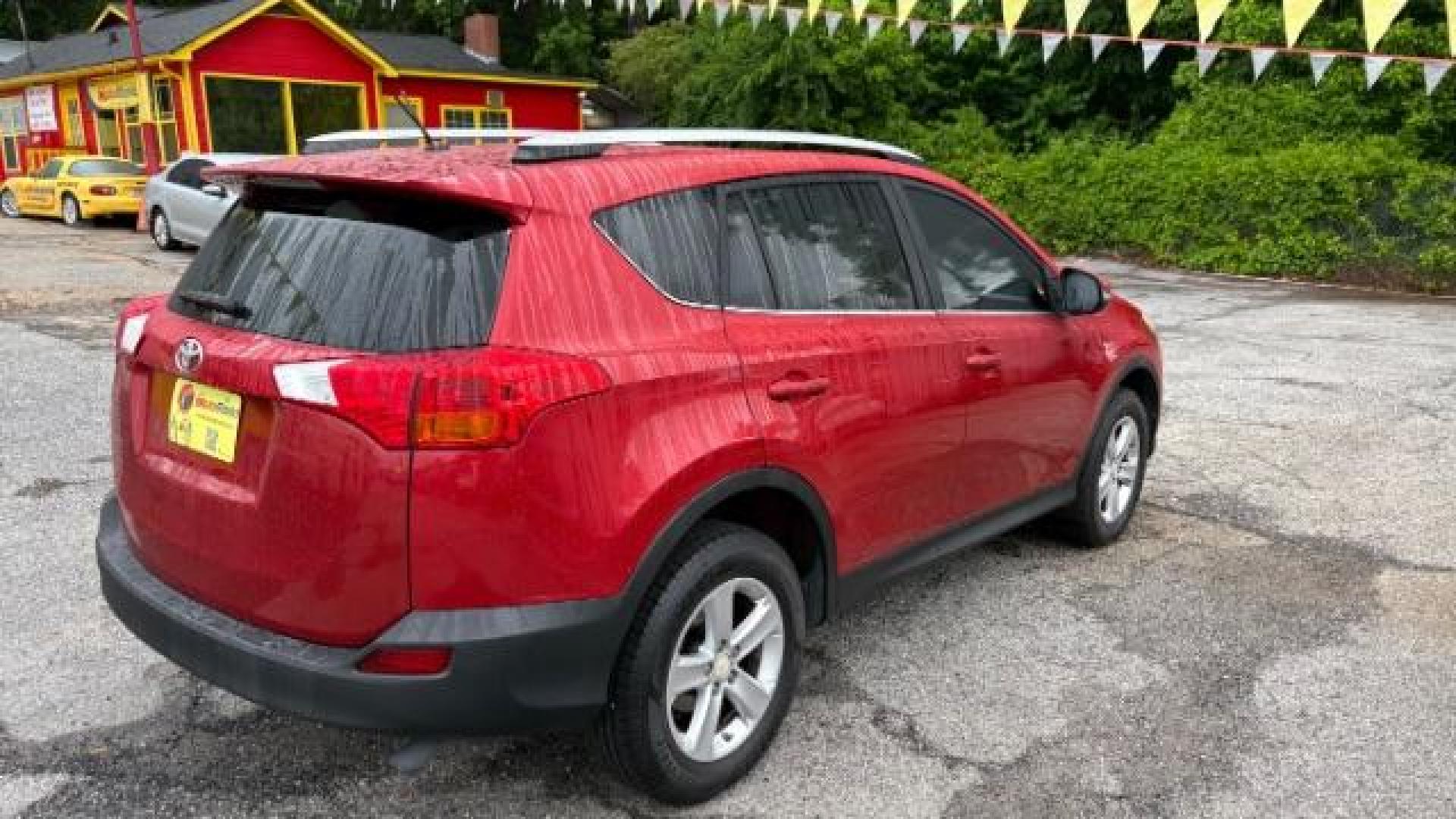 2013 Red Toyota RAV4 XLE FWD (2T3WFREV3DW) with an 2.5L L4 DOHC 16V engine, 6-Speed Automatic transmission, located at 1806 Veterans Memorial Hwy SW, Austell, GA, 30168, (770) 944-9558, 33.817959, -84.606987 - Photo#3