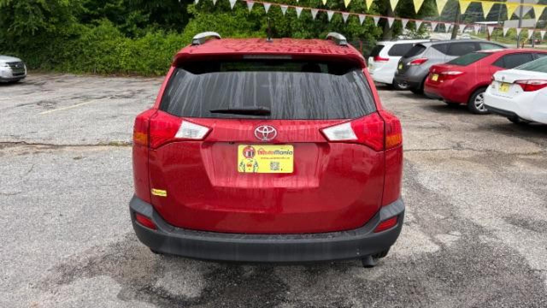 2013 Red Toyota RAV4 XLE FWD (2T3WFREV3DW) with an 2.5L L4 DOHC 16V engine, 6-Speed Automatic transmission, located at 1806 Veterans Memorial Hwy SW, Austell, GA, 30168, (770) 944-9558, 33.817959, -84.606987 - Photo#4