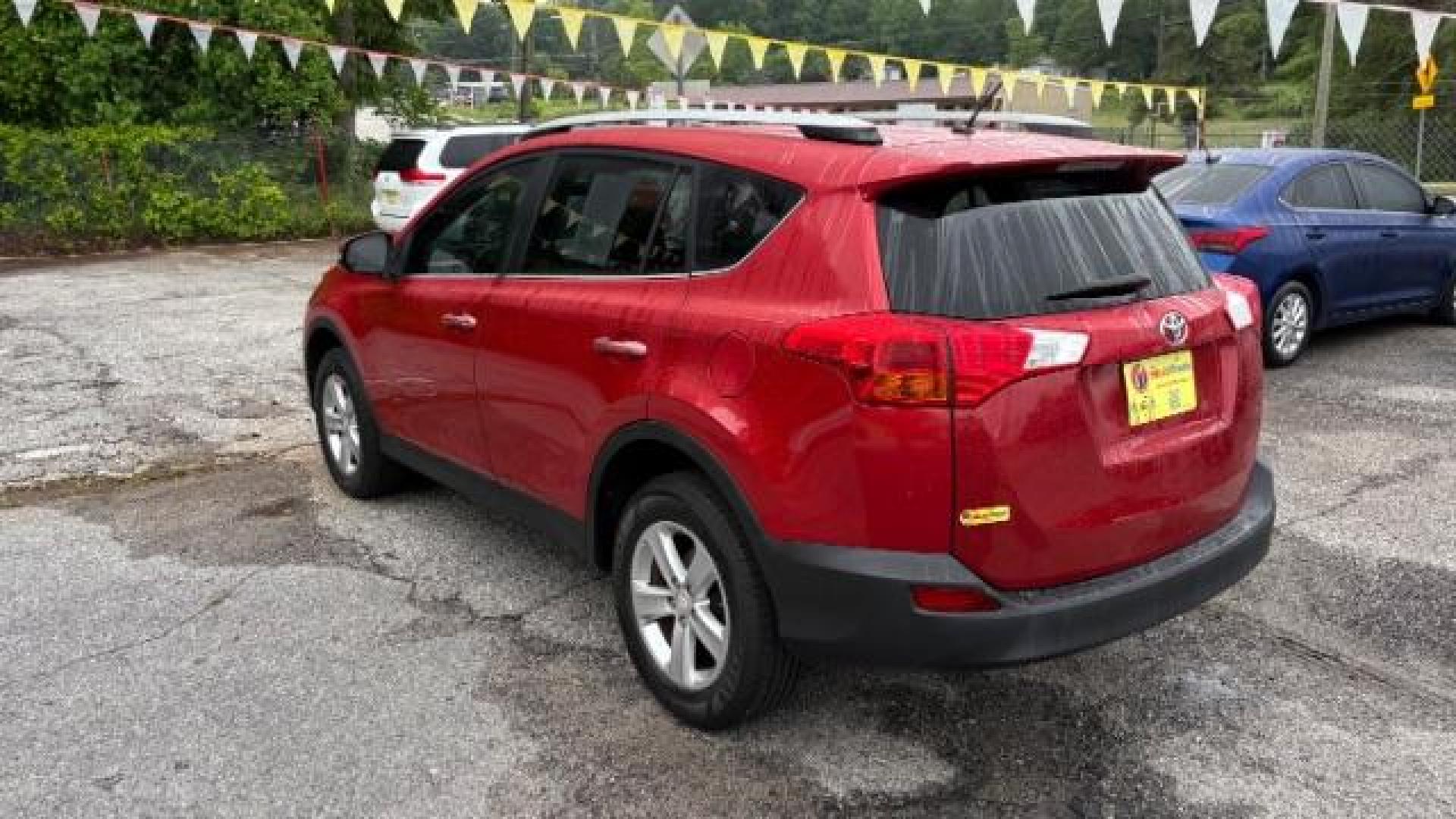 2013 Red Toyota RAV4 XLE FWD (2T3WFREV3DW) with an 2.5L L4 DOHC 16V engine, 6-Speed Automatic transmission, located at 1806 Veterans Memorial Hwy SW, Austell, GA, 30168, (770) 944-9558, 33.817959, -84.606987 - Photo#5