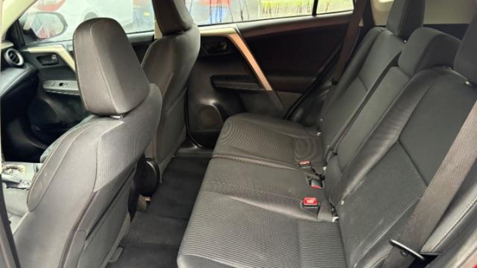 2013 Red Toyota RAV4 XLE FWD (2T3WFREV3DW) with an 2.5L L4 DOHC 16V engine, 6-Speed Automatic transmission, located at 1806 Veterans Memorial Hwy SW, Austell, GA, 30168, (770) 944-9558, 33.817959, -84.606987 - Photo#11