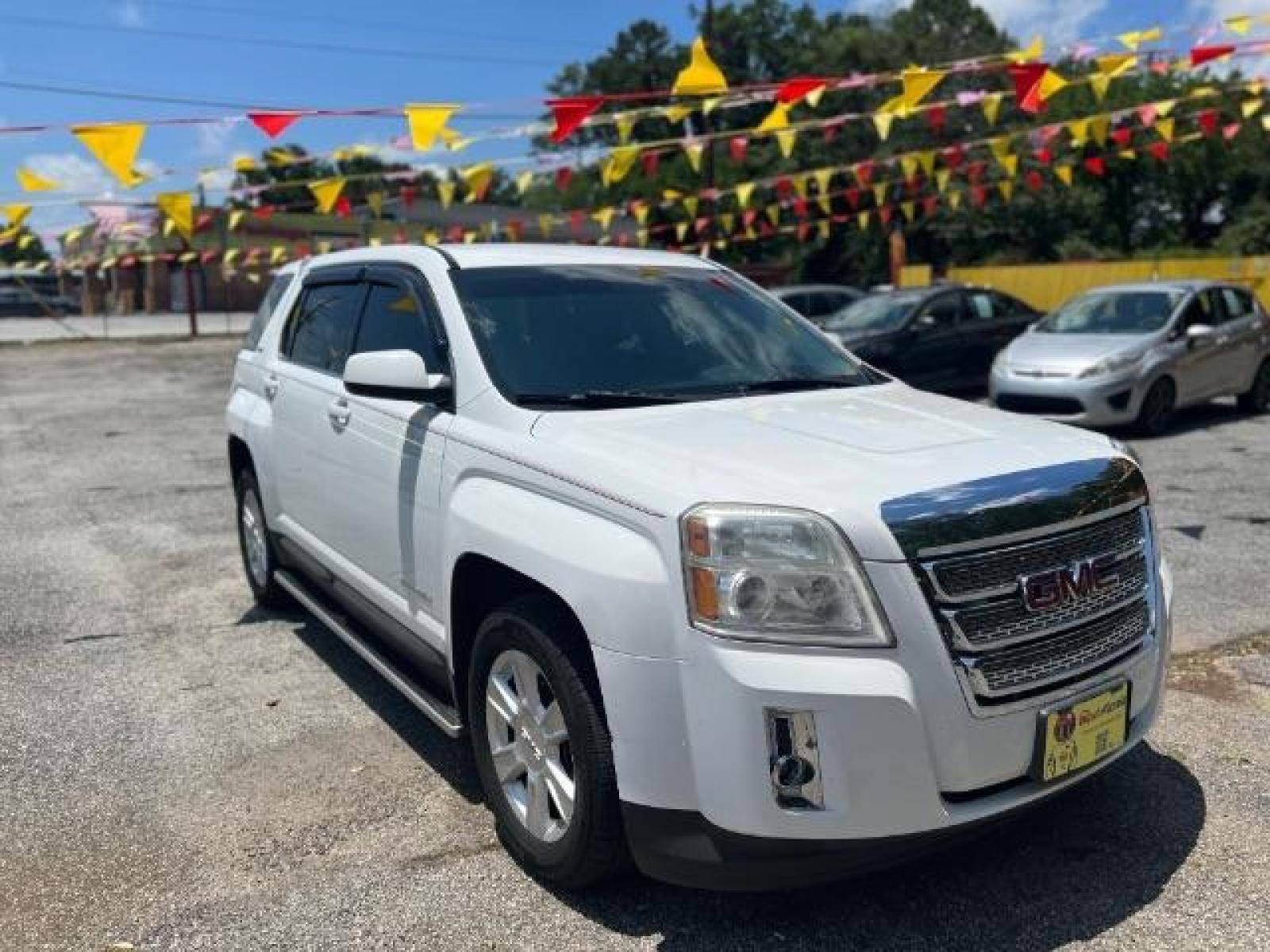 2013 White GMC Terrain SLE1 AWD (2GKFLREKXD6) with an 2.4L L4 DOHC 16V FFV engine, 6-Speed Automatic transmission, located at 1806 Veterans Memorial Hwy SW, Austell, GA, 30168, (770) 944-9558, 33.817959, -84.606987 - Photo #0