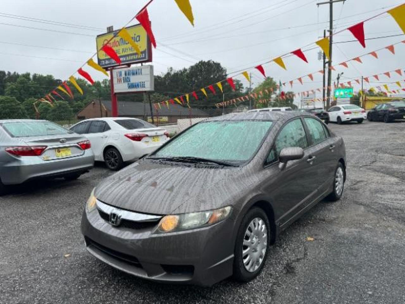 2011 Gray Honda Civic LX Sedan 5-Speed AT (19XFA1F52BE) with an 1.8L L4 SOHC 16V engine, 5-Speed Automatic transmission, located at 1806 Veterans Memorial Hwy SW, Austell, GA, 30168, (770) 944-9558, 33.817959, -84.606987 - Photo #0