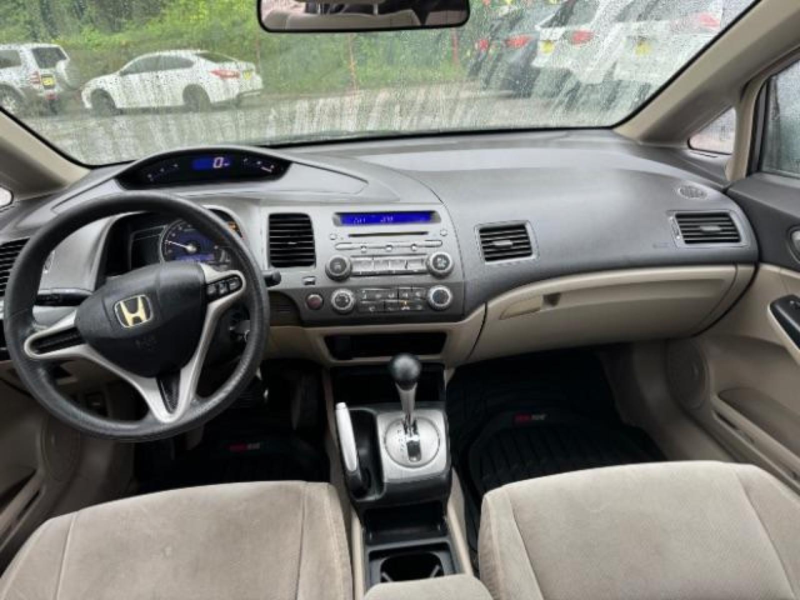 2011 Gray Honda Civic LX Sedan 5-Speed AT (19XFA1F52BE) with an 1.8L L4 SOHC 16V engine, 5-Speed Automatic transmission, located at 1806 Veterans Memorial Hwy SW, Austell, GA, 30168, (770) 944-9558, 33.817959, -84.606987 - Photo #11