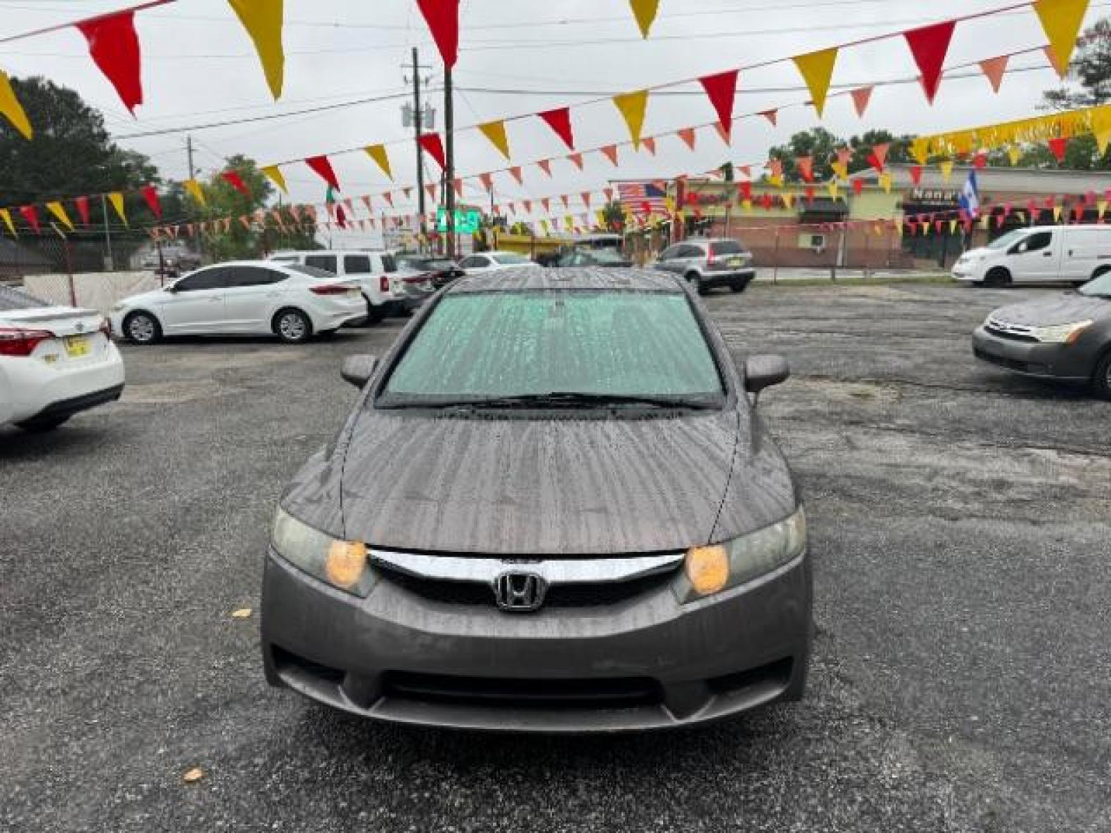 2011 Gray Honda Civic LX Sedan 5-Speed AT (19XFA1F52BE) with an 1.8L L4 SOHC 16V engine, 5-Speed Automatic transmission, located at 1806 Veterans Memorial Hwy SW, Austell, GA, 30168, (770) 944-9558, 33.817959, -84.606987 - Photo #1