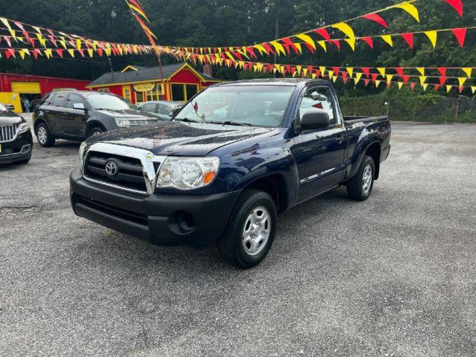2006 Blue Toyota Tacoma Regular Cab 2WD (5TENX22N36Z) with an 2.7L L4 DOHC 16V engine, 5-Speed Manual transmission, located at 1806 Veterans Memorial Hwy SW, Austell, GA, 30168, (770) 944-9558, 33.817959, -84.606987 - Photo #0