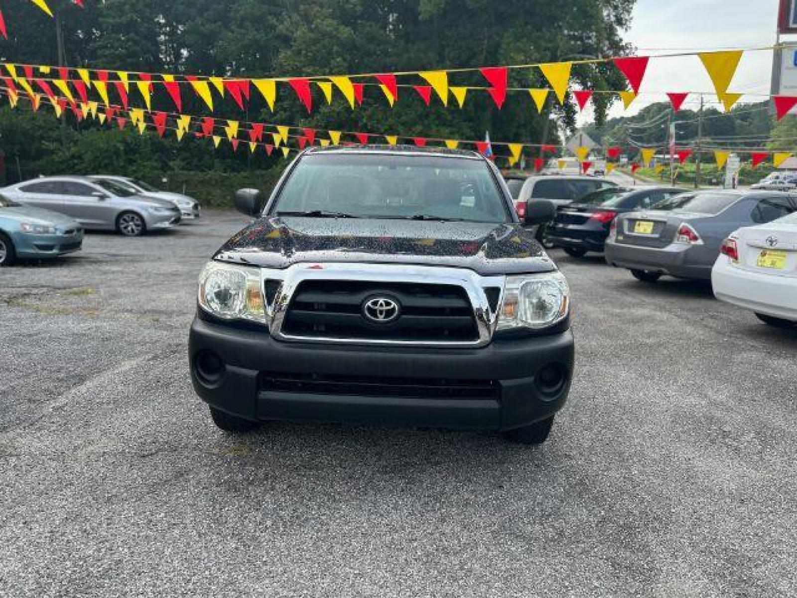 2006 Blue Toyota Tacoma Regular Cab 2WD (5TENX22N36Z) with an 2.7L L4 DOHC 16V engine, 5-Speed Manual transmission, located at 1806 Veterans Memorial Hwy SW, Austell, GA, 30168, (770) 944-9558, 33.817959, -84.606987 - Photo #1