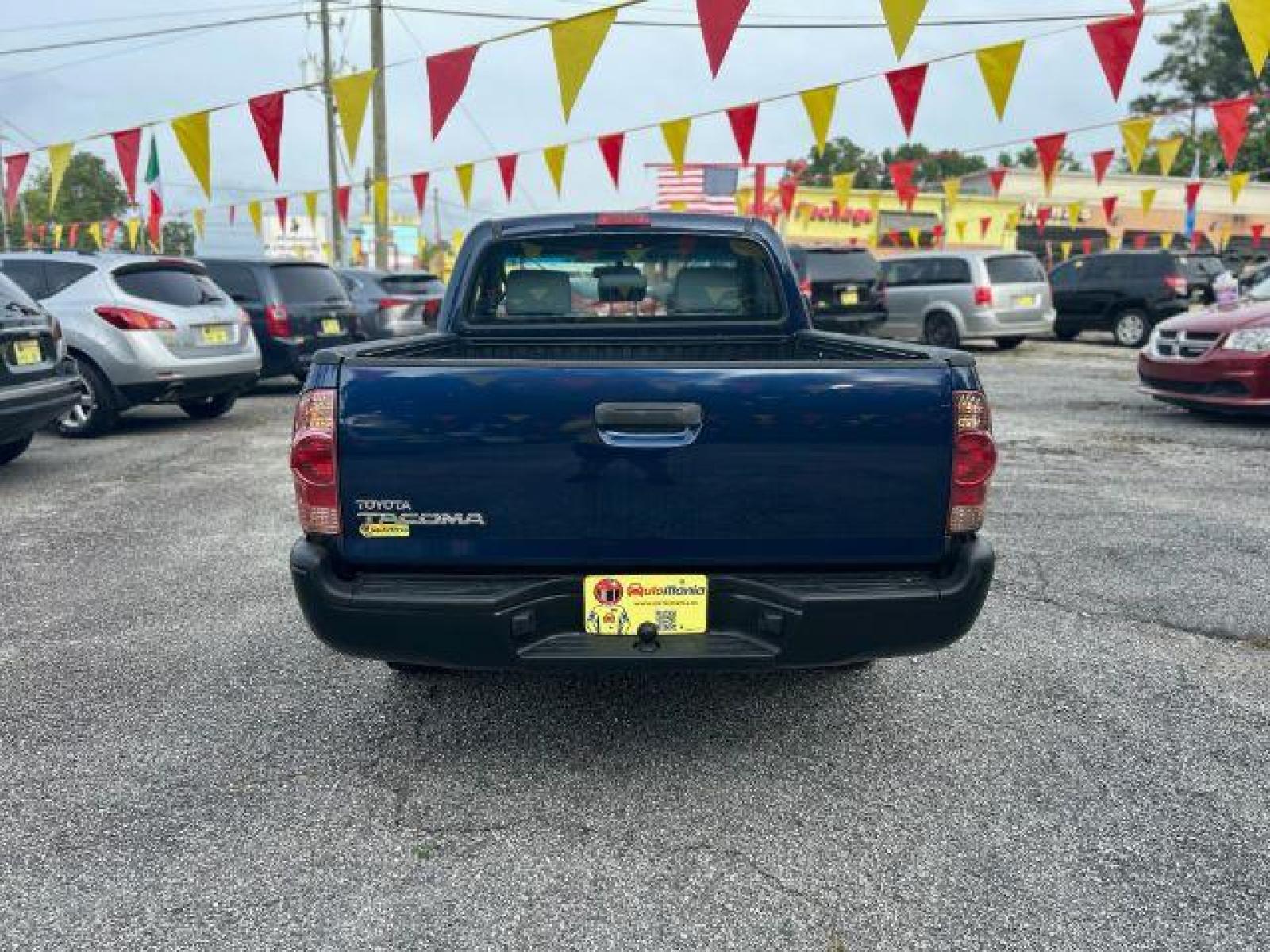 2006 Blue Toyota Tacoma Regular Cab 2WD (5TENX22N36Z) with an 2.7L L4 DOHC 16V engine, 5-Speed Manual transmission, located at 1806 Veterans Memorial Hwy SW, Austell, GA, 30168, (770) 944-9558, 33.817959, -84.606987 - Photo #4