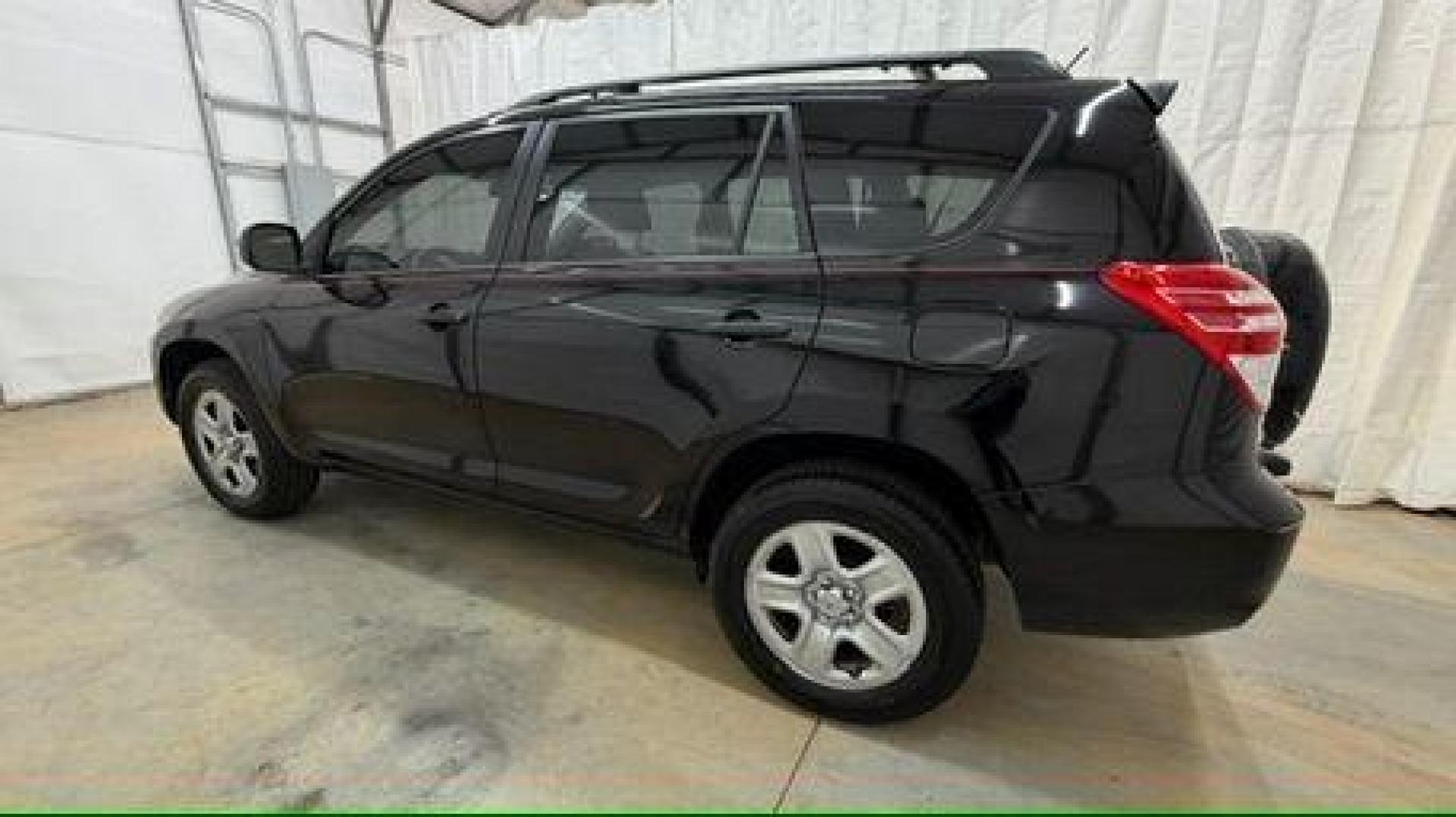 2012 Black Toyota RAV4 Base I4 2WD (2T3ZF4DV0CW) with an 2.4L L4 DOHC 16V engine, 4-Speed Automatic transmission, located at 1806 Veterans Memorial Hwy SW, Austell, GA, 30168, (770) 944-9558, 33.817959, -84.606987- Photo#2