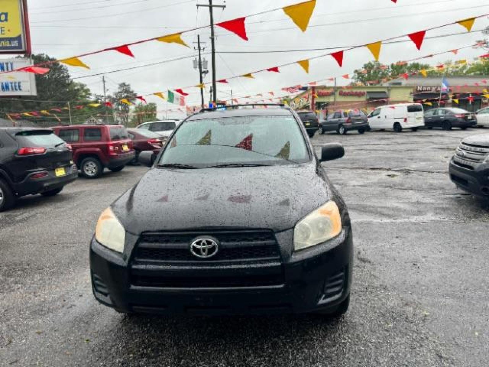 2012 Black Toyota RAV4 Base I4 2WD (2T3ZF4DV0CW) with an 2.4L L4 DOHC 16V engine, 4-Speed Automatic transmission, located at 1806 Veterans Memorial Hwy SW, Austell, GA, 30168, (770) 944-9558, 33.817959, -84.606987 - Photo #1