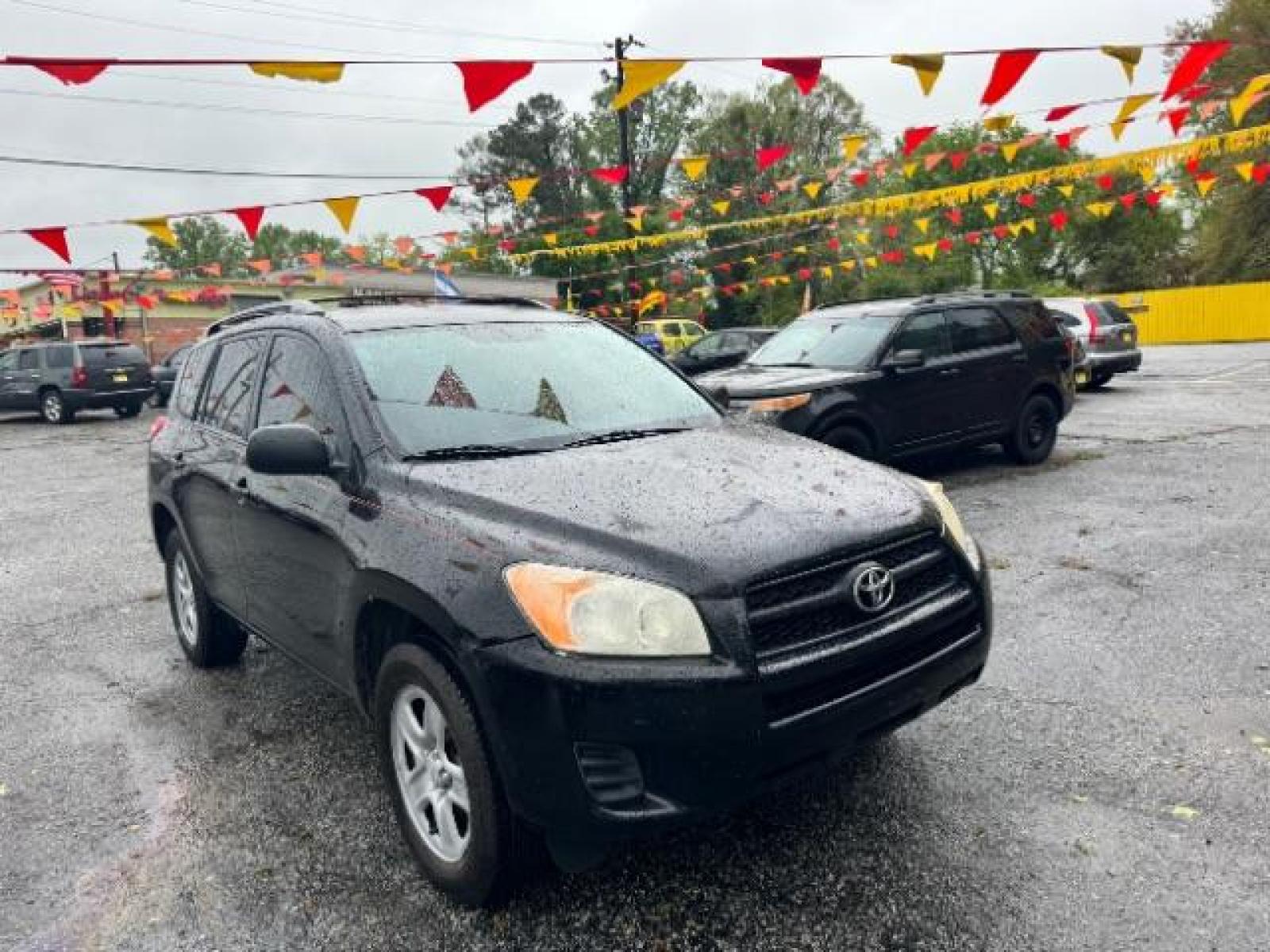 2012 Black Toyota RAV4 Base I4 2WD (2T3ZF4DV0CW) with an 2.4L L4 DOHC 16V engine, 4-Speed Automatic transmission, located at 1806 Veterans Memorial Hwy SW, Austell, GA, 30168, (770) 944-9558, 33.817959, -84.606987 - Photo #2