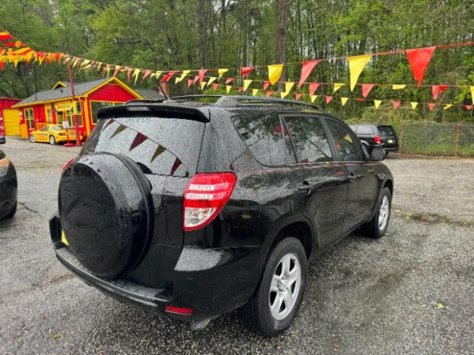 2012 Black Toyota RAV4 Base I4 2WD (2T3ZF4DV0CW) with an 2.4L L4 DOHC 16V engine, 4-Speed Automatic transmission, located at 1806 Veterans Memorial Hwy SW, Austell, GA, 30168, (770) 944-9558, 33.817959, -84.606987 - Photo #3