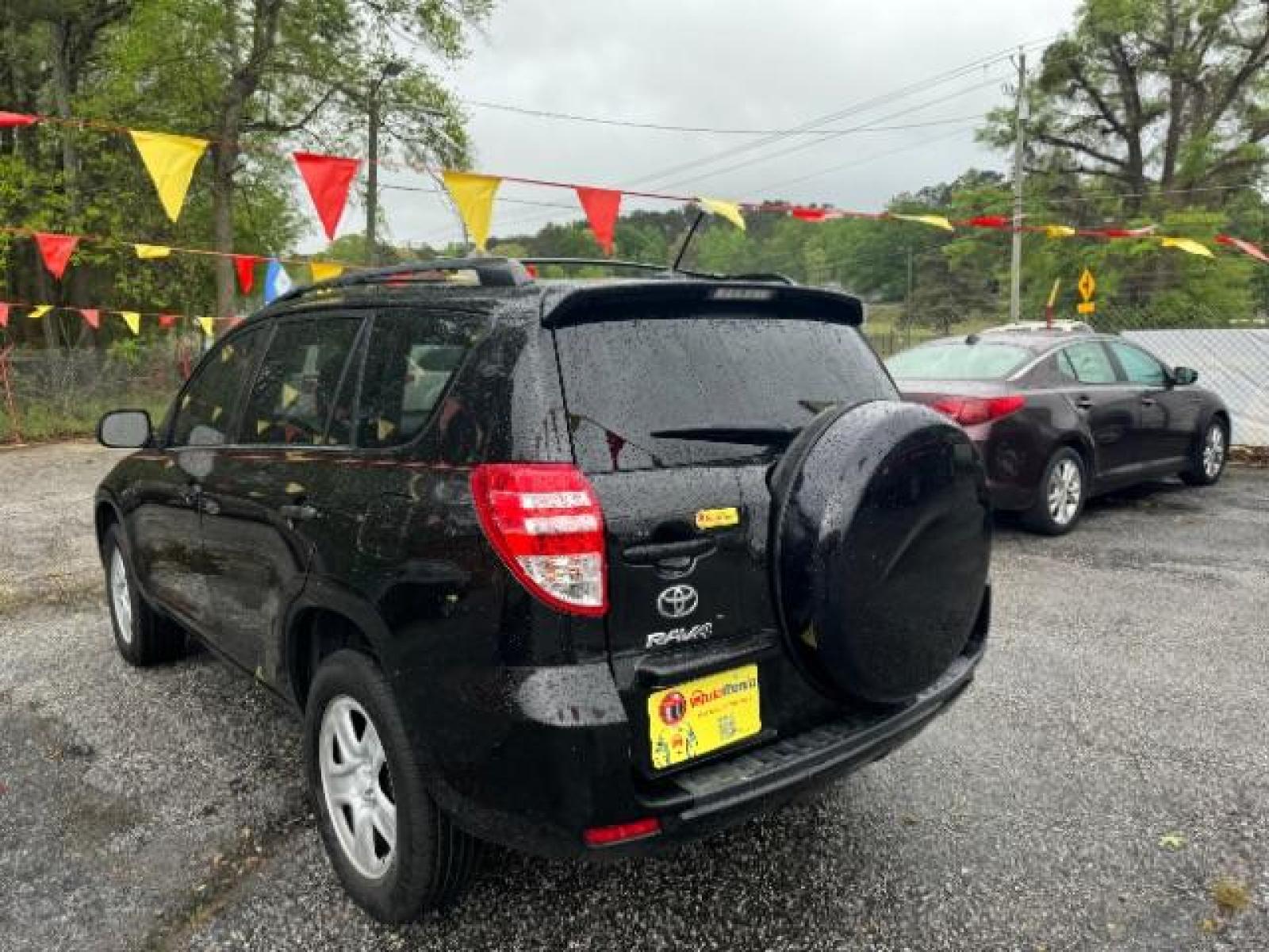 2012 Black Toyota RAV4 Base I4 2WD (2T3ZF4DV0CW) with an 2.4L L4 DOHC 16V engine, 4-Speed Automatic transmission, located at 1806 Veterans Memorial Hwy SW, Austell, GA, 30168, (770) 944-9558, 33.817959, -84.606987 - Photo #5