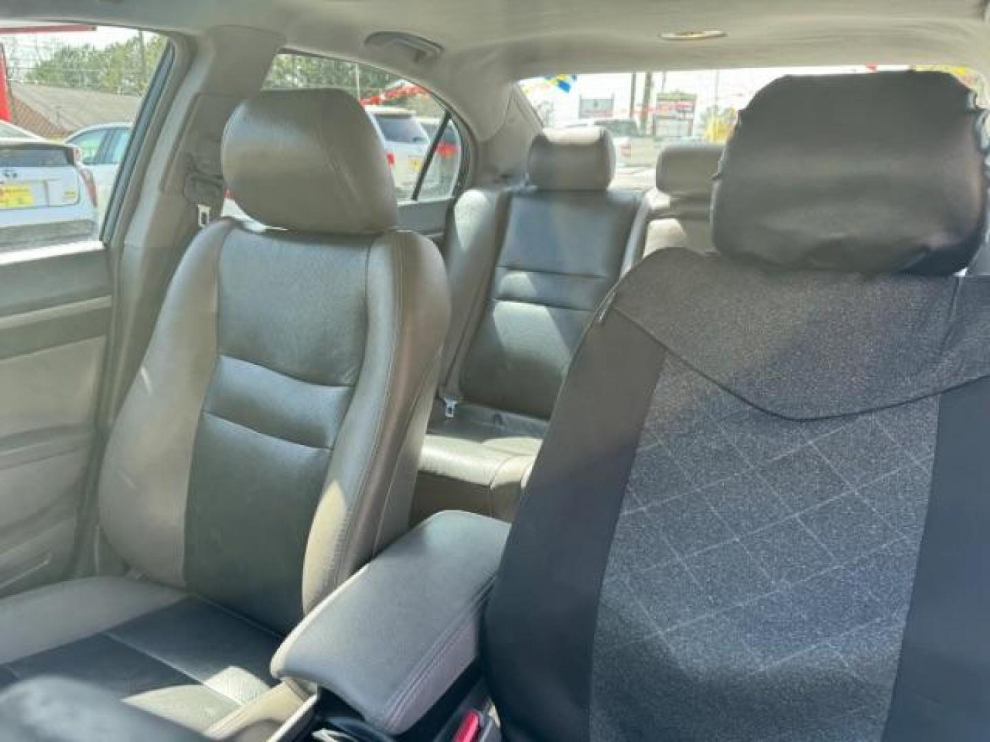 2009 Black Honda Civic EX Sedan 5-Speed AT (2HGFA16859H) with an 1.8L L4 SOHC 16V engine, 5-Speed Automatic transmission, located at 1806 Veterans Memorial Hwy SW, Austell, GA, 30168, (770) 944-9558, 33.817959, -84.606987 - Photo#9