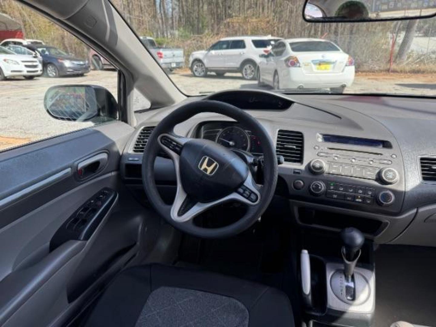 2009 Black Honda Civic EX Sedan 5-Speed AT (2HGFA16859H) with an 1.8L L4 SOHC 16V engine, 5-Speed Automatic transmission, located at 1806 Veterans Memorial Hwy SW, Austell, GA, 30168, (770) 944-9558, 33.817959, -84.606987 - Photo#11