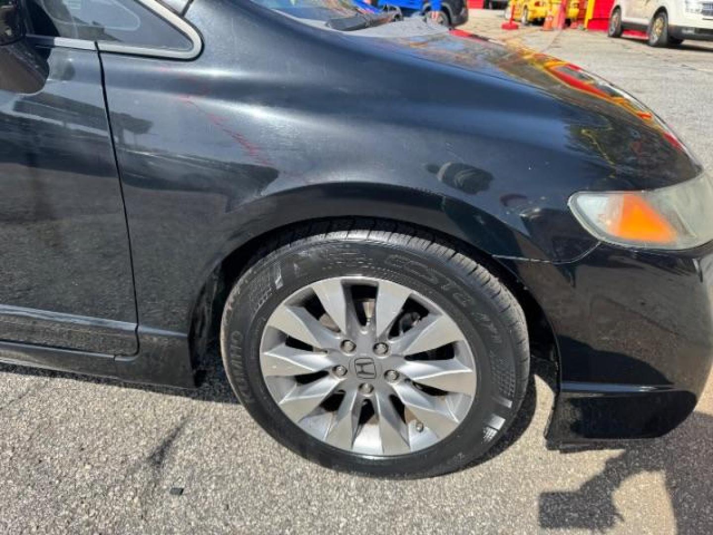 2009 Black Honda Civic EX Sedan 5-Speed AT (2HGFA16859H) with an 1.8L L4 SOHC 16V engine, 5-Speed Automatic transmission, located at 1806 Veterans Memorial Hwy SW, Austell, GA, 30168, (770) 944-9558, 33.817959, -84.606987 - Photo#14