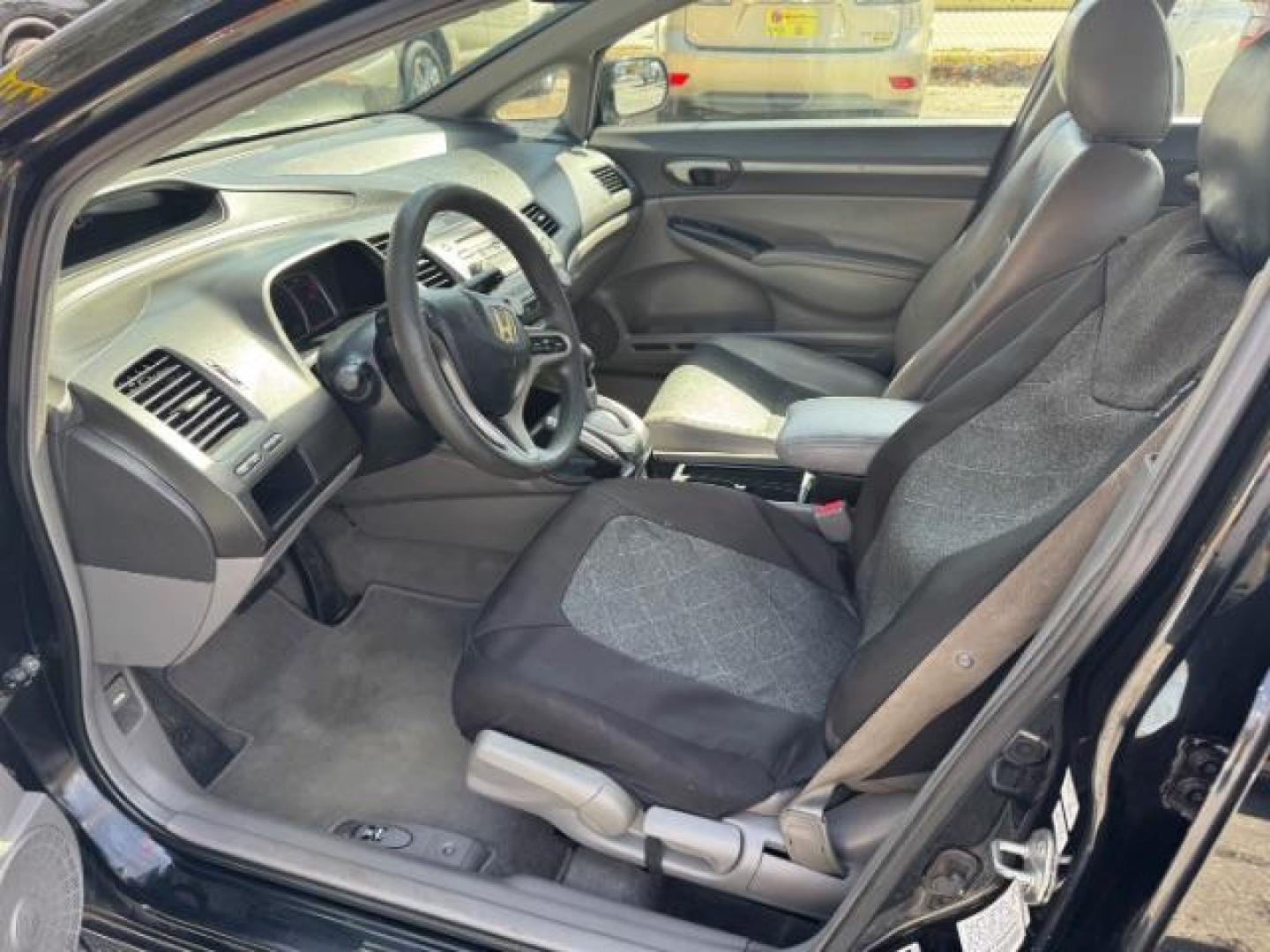 2009 Black Honda Civic EX Sedan 5-Speed AT (2HGFA16859H) with an 1.8L L4 SOHC 16V engine, 5-Speed Automatic transmission, located at 1806 Veterans Memorial Hwy SW, Austell, GA, 30168, (770) 944-9558, 33.817959, -84.606987 - Photo#6