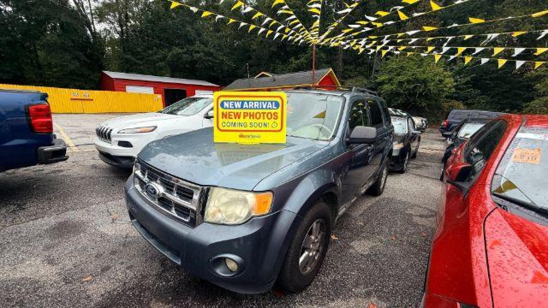 2011 Blue Ford Escape XLT FWD (1FMCU0D75BK) with an 2.5L L4 DOHC 16V engine, 6-Speed Automatic transmission, located at 1806 Veterans Memorial Hwy SW, Austell, GA, 30168, (770) 944-9558, 33.817959, -84.606987 - Photo#0