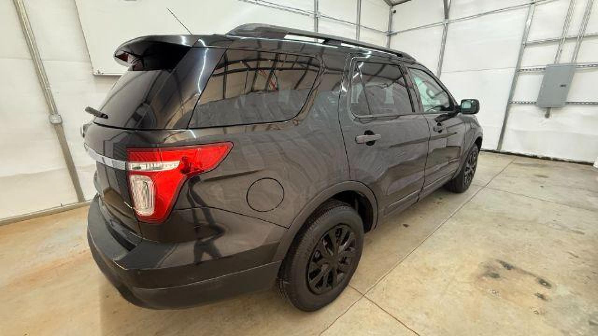 2014 Black Ford Explorer Base FWD (1FM5K7B87EG) with an 3.5L V6 DOHC 24V engine, 6-Speed Automatic transmission, located at 1806 Veterans Memorial Hwy SW, Austell, GA, 30168, (770) 944-9558, 33.817959, -84.606987 - Photo#6