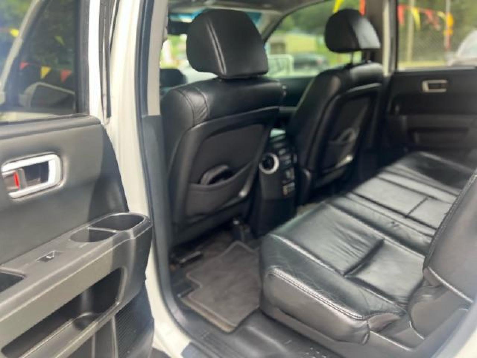 2012 White Honda Pilot Touring 4WD 5-Spd AT with DVD (5FNYF4H9XCB) with an 3.5L V6 SOHC 24V engine, 5-Speed Automatic transmission, located at 1806 Veterans Memorial Hwy SW, Austell, GA, 30168, (770) 944-9558, 33.817959, -84.606987 - Photo #13
