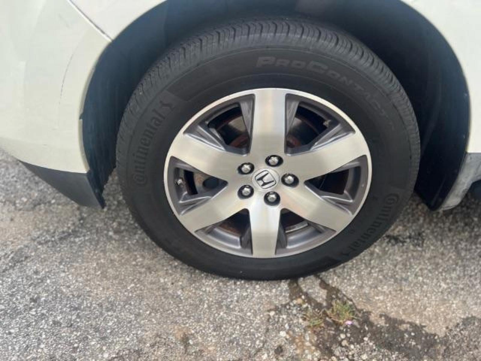2012 White Honda Pilot Touring 4WD 5-Spd AT with DVD (5FNYF4H9XCB) with an 3.5L V6 SOHC 24V engine, 5-Speed Automatic transmission, located at 1806 Veterans Memorial Hwy SW, Austell, GA, 30168, (770) 944-9558, 33.817959, -84.606987 - Photo #21