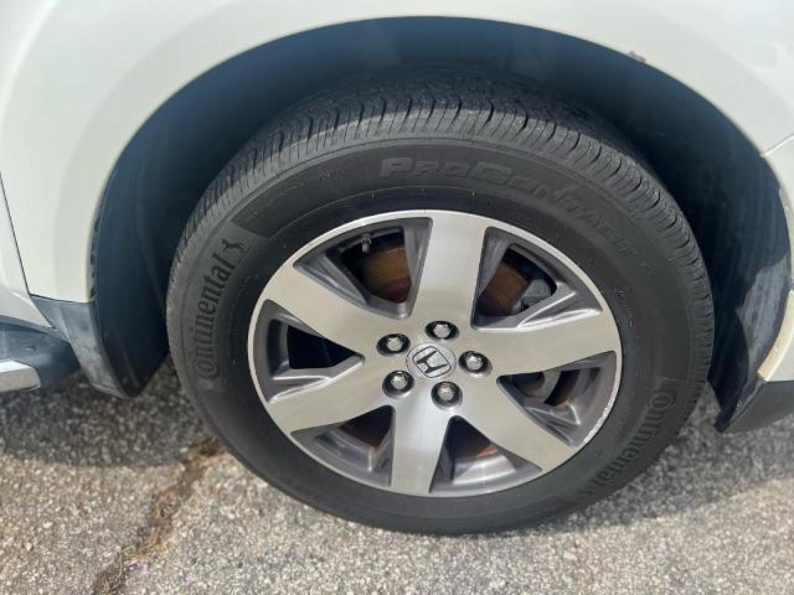 2012 White Honda Pilot Touring 4WD 5-Spd AT with DVD (5FNYF4H9XCB) with an 3.5L V6 SOHC 24V engine, 5-Speed Automatic transmission, located at 1806 Veterans Memorial Hwy SW, Austell, GA, 30168, (770) 944-9558, 33.817959, -84.606987 - Photo #22