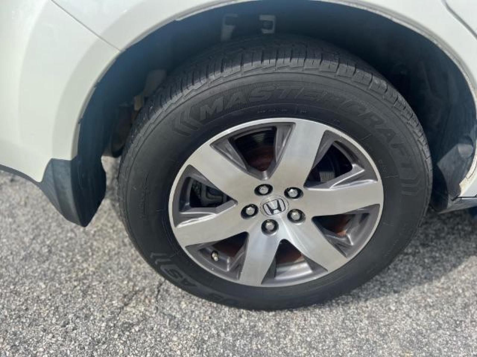 2012 White Honda Pilot Touring 4WD 5-Spd AT with DVD (5FNYF4H9XCB) with an 3.5L V6 SOHC 24V engine, 5-Speed Automatic transmission, located at 1806 Veterans Memorial Hwy SW, Austell, GA, 30168, (770) 944-9558, 33.817959, -84.606987 - Photo #23