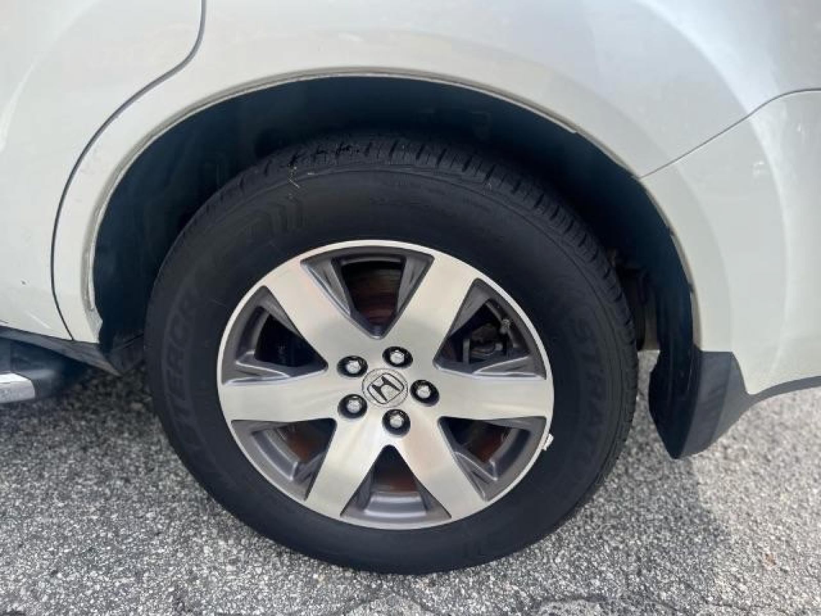 2012 White Honda Pilot Touring 4WD 5-Spd AT with DVD (5FNYF4H9XCB) with an 3.5L V6 SOHC 24V engine, 5-Speed Automatic transmission, located at 1806 Veterans Memorial Hwy SW, Austell, GA, 30168, (770) 944-9558, 33.817959, -84.606987 - Photo #24