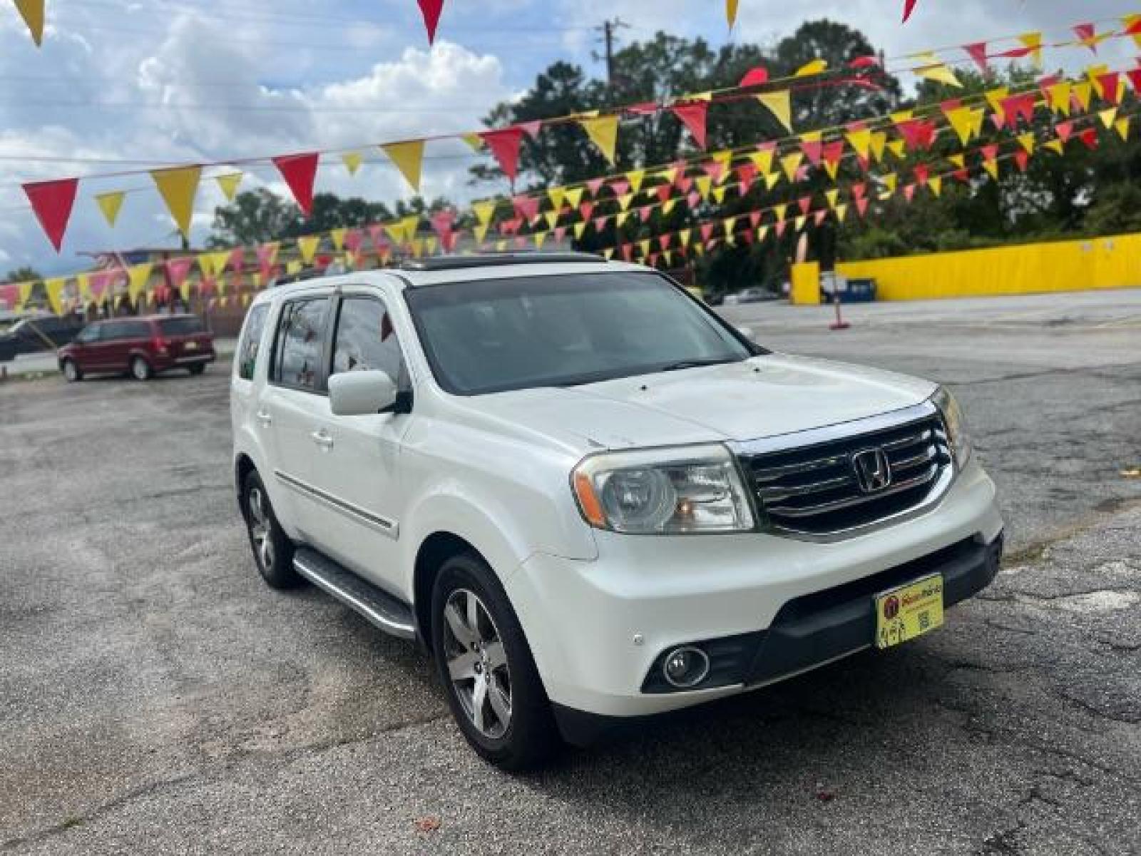2012 White Honda Pilot Touring 4WD 5-Spd AT with DVD (5FNYF4H9XCB) with an 3.5L V6 SOHC 24V engine, 5-Speed Automatic transmission, located at 1806 Veterans Memorial Hwy SW, Austell, GA, 30168, (770) 944-9558, 33.817959, -84.606987 - Photo #2