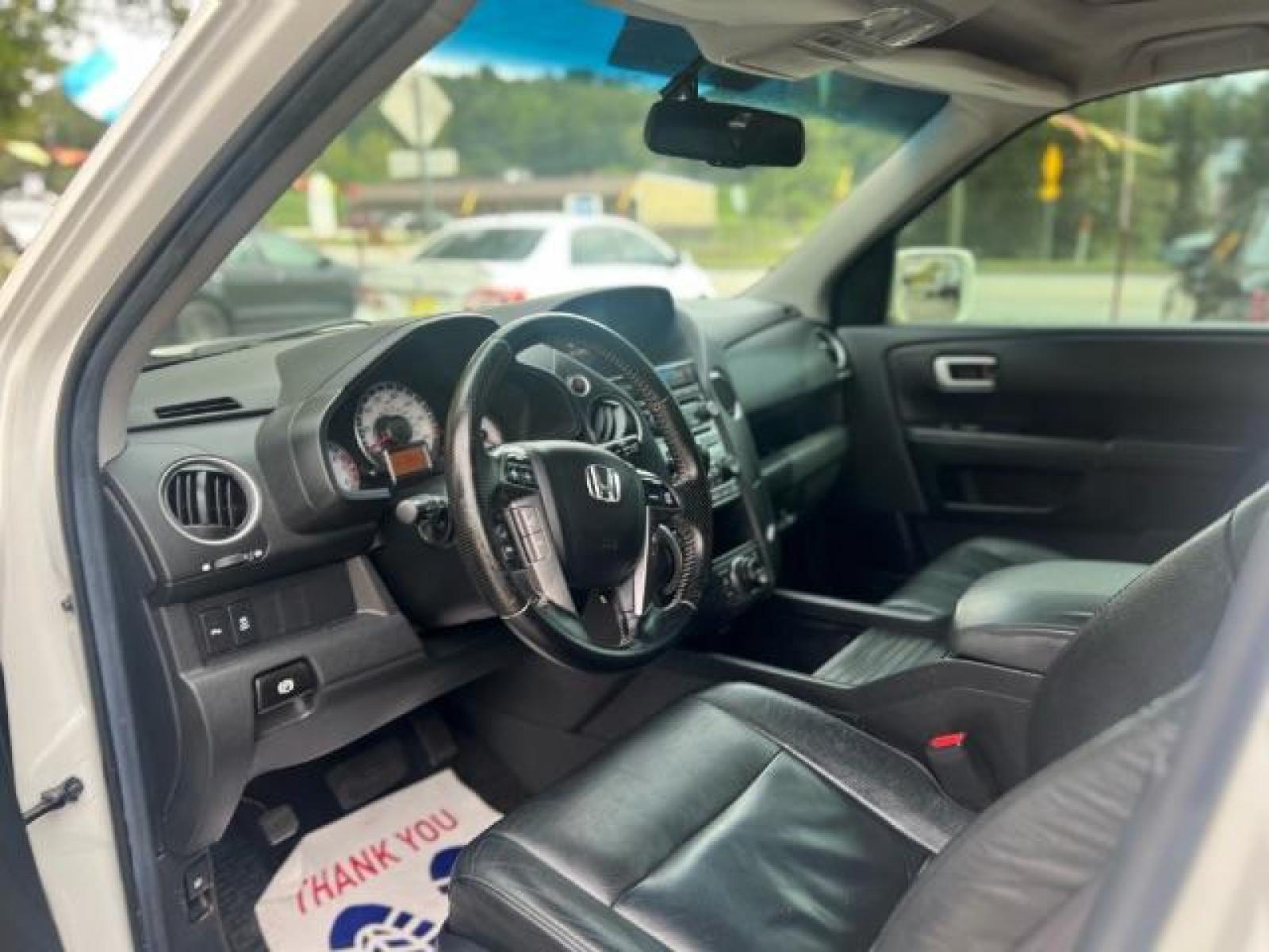 2012 White Honda Pilot Touring 4WD 5-Spd AT with DVD (5FNYF4H9XCB) with an 3.5L V6 SOHC 24V engine, 5-Speed Automatic transmission, located at 1806 Veterans Memorial Hwy SW, Austell, GA, 30168, (770) 944-9558, 33.817959, -84.606987 - Photo #6