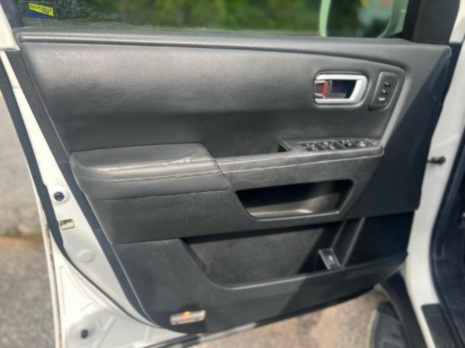2012 White Honda Pilot Touring 4WD 5-Spd AT with DVD (5FNYF4H9XCB) with an 3.5L V6 SOHC 24V engine, 5-Speed Automatic transmission, located at 1806 Veterans Memorial Hwy SW, Austell, GA, 30168, (770) 944-9558, 33.817959, -84.606987 - Photo #7