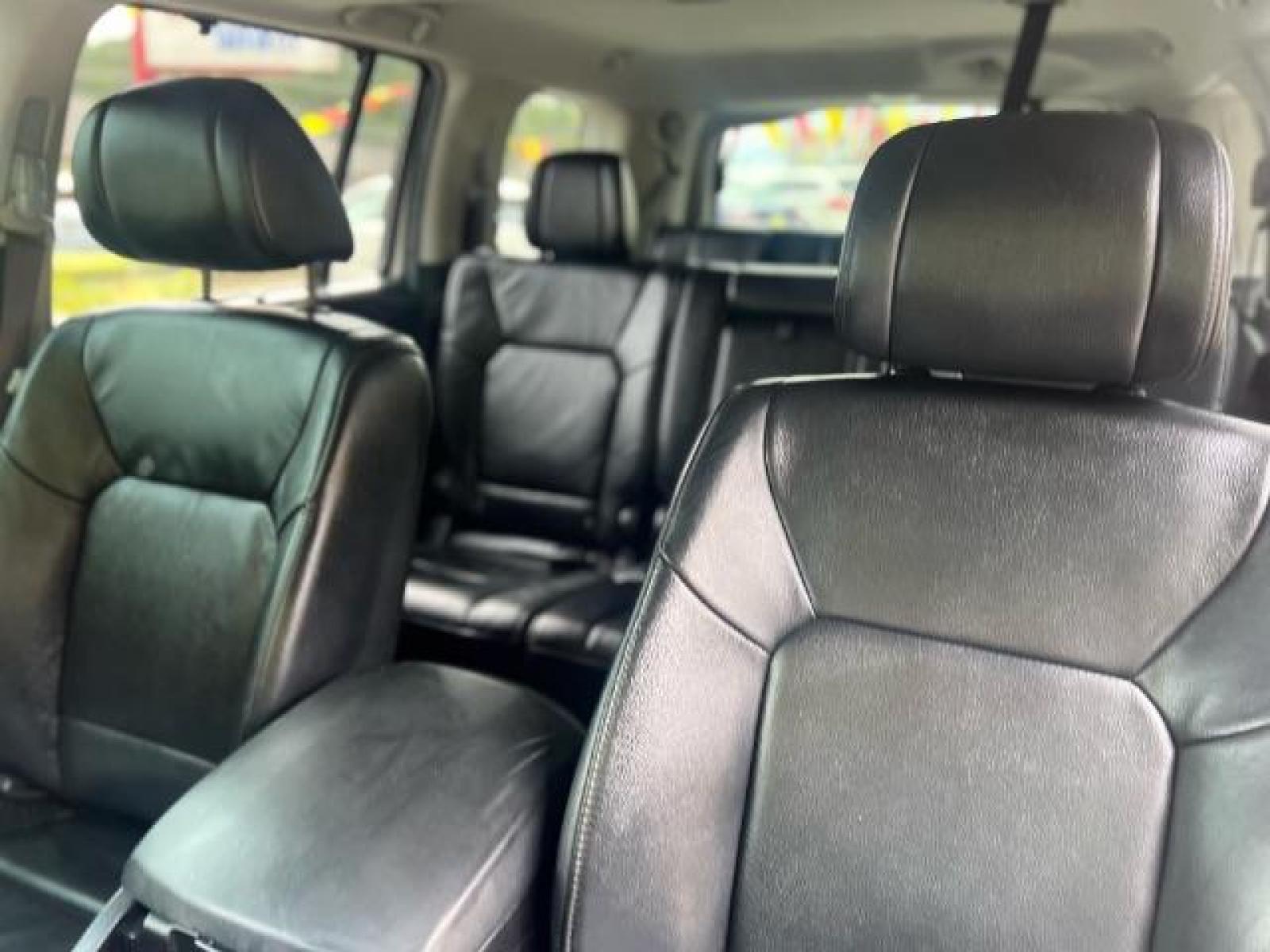 2012 White Honda Pilot Touring 4WD 5-Spd AT with DVD (5FNYF4H9XCB) with an 3.5L V6 SOHC 24V engine, 5-Speed Automatic transmission, located at 1806 Veterans Memorial Hwy SW, Austell, GA, 30168, (770) 944-9558, 33.817959, -84.606987 - Photo #8