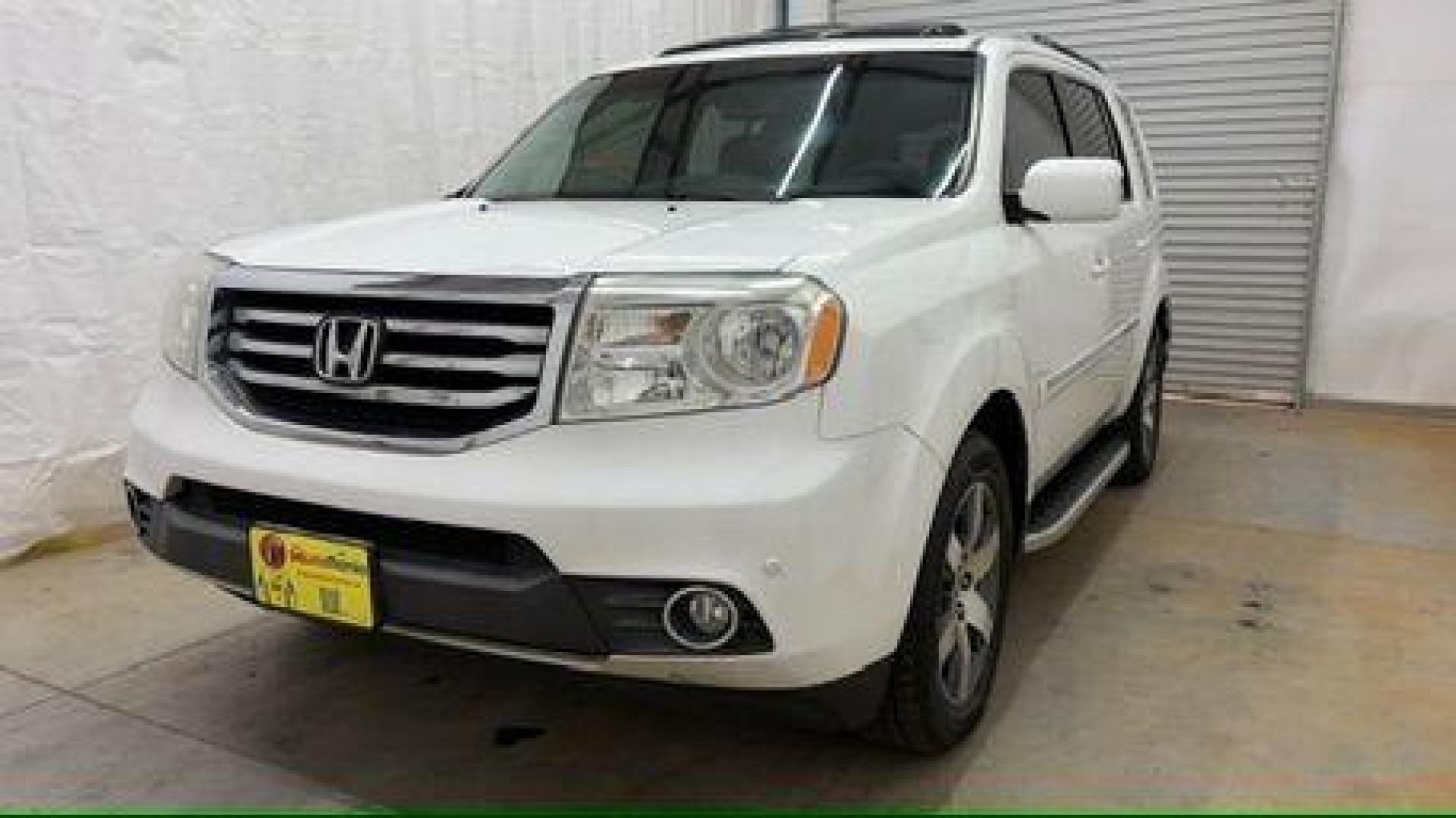 2012 White Honda Pilot Touring 4WD 5-Spd AT (5FNYF4H9XCB) with an 3.5L V6 SOHC 24V engine, 5-Speed Automatic transmission, located at 1806 Veterans Memorial Hwy SW, Austell, GA, 30168, (770) 944-9558, 33.817959, -84.606987 - Photo#0