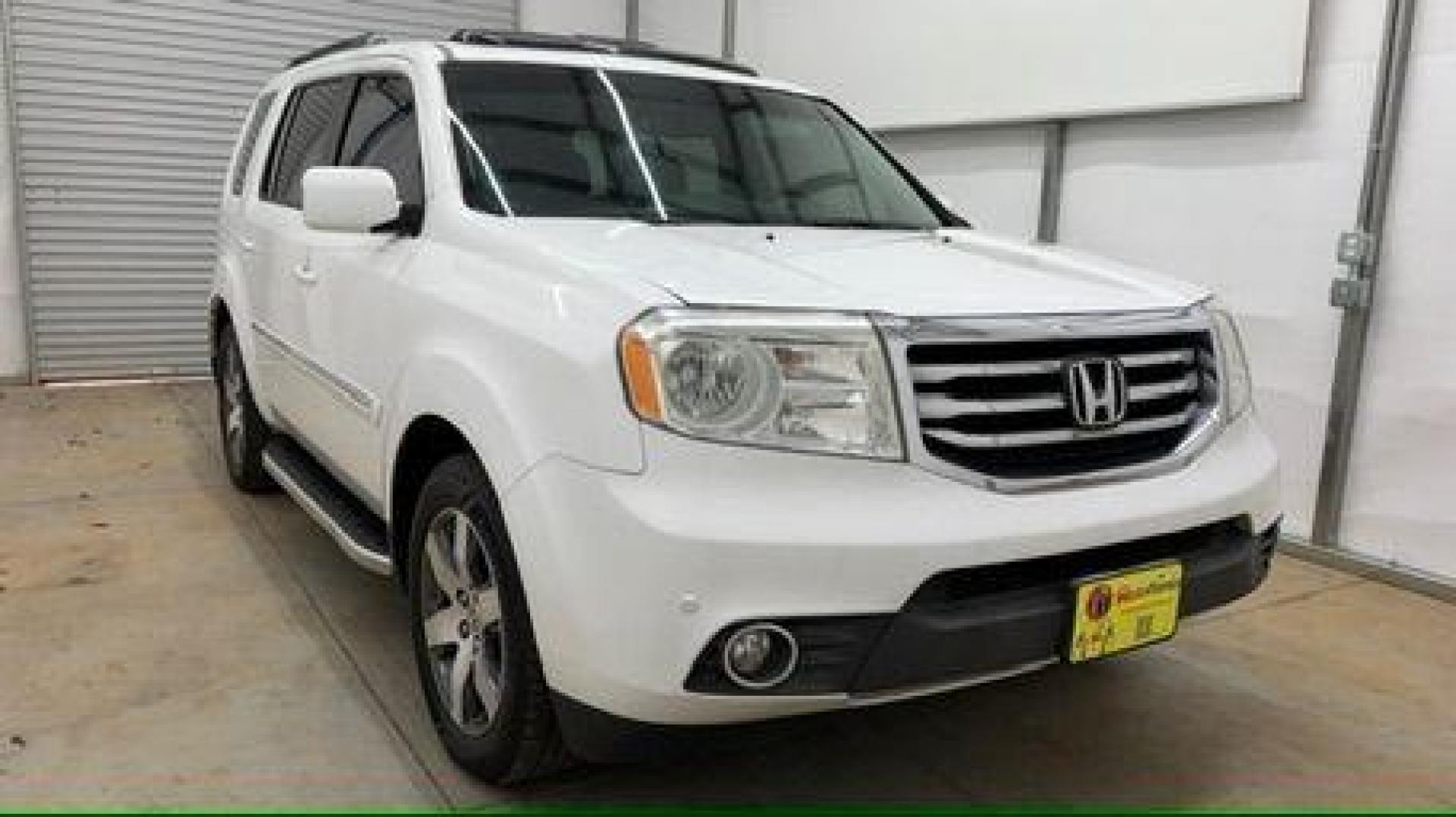 2012 White Honda Pilot Touring 4WD 5-Spd AT (5FNYF4H9XCB) with an 3.5L V6 SOHC 24V engine, 5-Speed Automatic transmission, located at 1806 Veterans Memorial Hwy SW, Austell, GA, 30168, (770) 944-9558, 33.817959, -84.606987 - Photo#8
