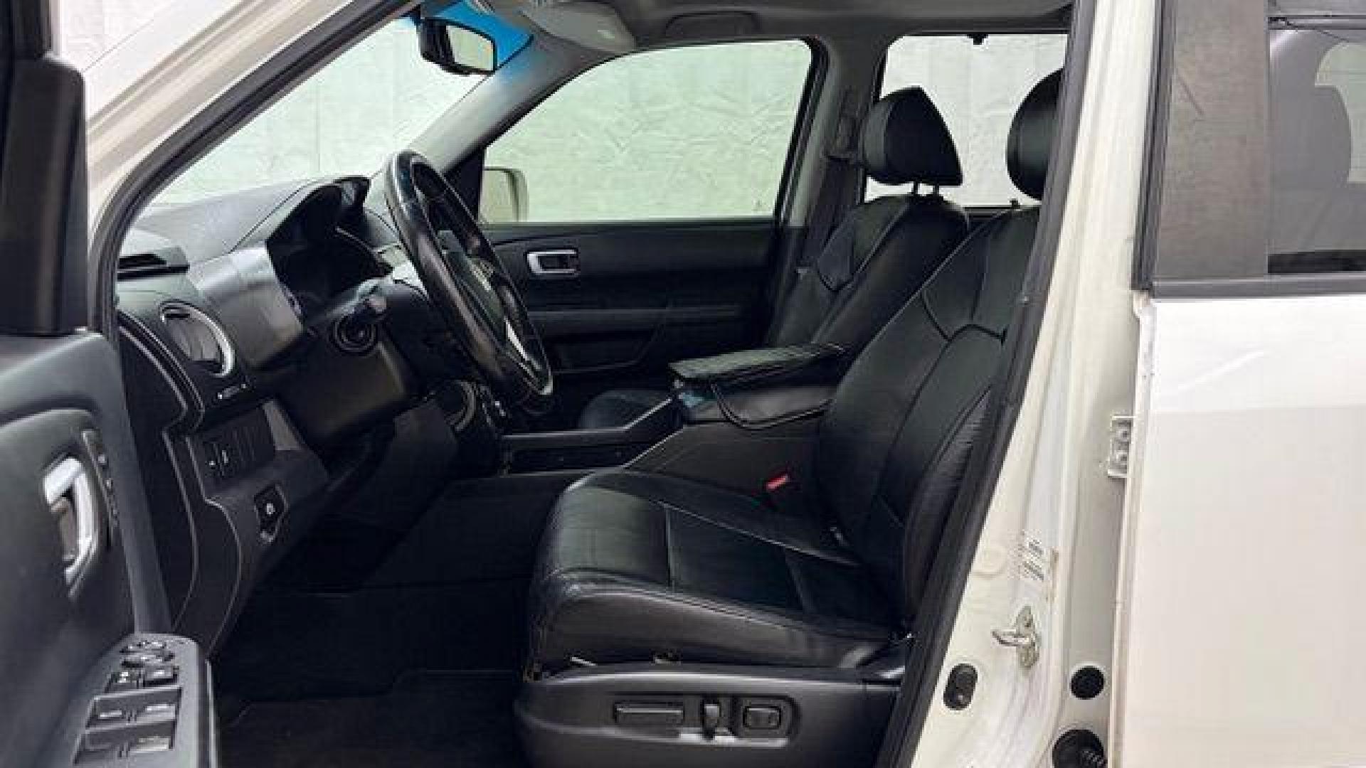 2012 White Honda Pilot Touring 4WD 5-Spd AT (5FNYF4H9XCB) with an 3.5L V6 SOHC 24V engine, 5-Speed Automatic transmission, located at 1806 Veterans Memorial Hwy SW, Austell, GA, 30168, (770) 944-9558, 33.817959, -84.606987 - Photo#11