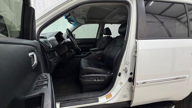 2012 White Honda Pilot Touring 4WD 5-Spd AT (5FNYF4H9XCB) with an 3.5L V6 SOHC 24V engine, 5-Speed Automatic transmission, located at 1806 Veterans Memorial Hwy SW, Austell, GA, 30168, (770) 944-9558, 33.817959, -84.606987 - Photo#12