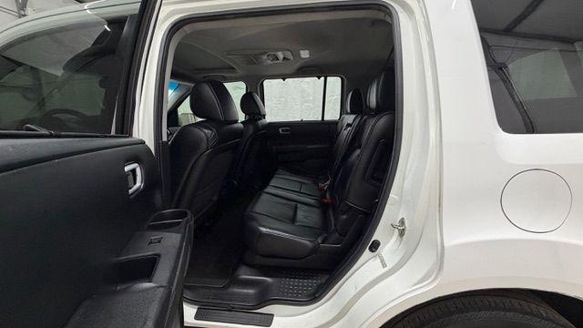 2012 White Honda Pilot Touring 4WD 5-Spd AT (5FNYF4H9XCB) with an 3.5L V6 SOHC 24V engine, 5-Speed Automatic transmission, located at 1806 Veterans Memorial Hwy SW, Austell, GA, 30168, (770) 944-9558, 33.817959, -84.606987 - Photo#14