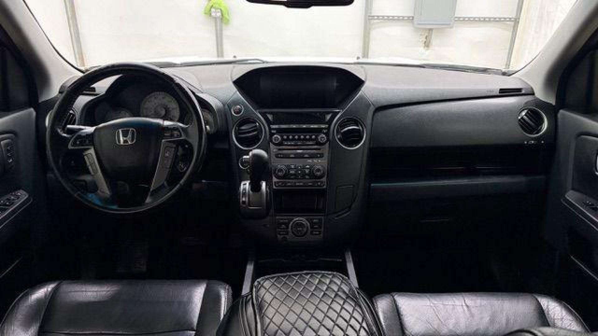 2012 White Honda Pilot Touring 4WD 5-Spd AT (5FNYF4H9XCB) with an 3.5L V6 SOHC 24V engine, 5-Speed Automatic transmission, located at 1806 Veterans Memorial Hwy SW, Austell, GA, 30168, (770) 944-9558, 33.817959, -84.606987 - Photo#16