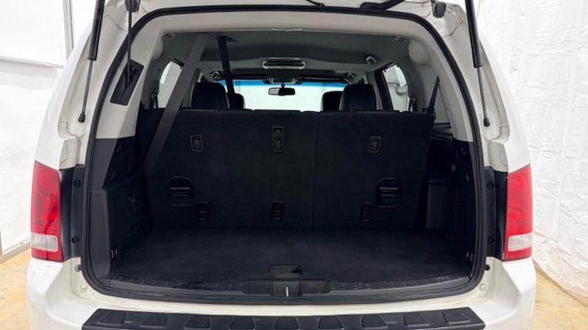 2012 White Honda Pilot Touring 4WD 5-Spd AT (5FNYF4H9XCB) with an 3.5L V6 SOHC 24V engine, 5-Speed Automatic transmission, located at 1806 Veterans Memorial Hwy SW, Austell, GA, 30168, (770) 944-9558, 33.817959, -84.606987 - Photo#17