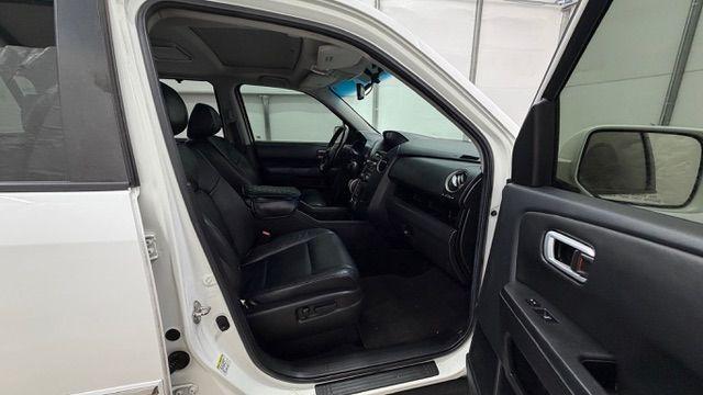 2012 White Honda Pilot Touring 4WD 5-Spd AT (5FNYF4H9XCB) with an 3.5L V6 SOHC 24V engine, 5-Speed Automatic transmission, located at 1806 Veterans Memorial Hwy SW, Austell, GA, 30168, (770) 944-9558, 33.817959, -84.606987 - Photo#19