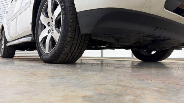 2012 White Honda Pilot Touring 4WD 5-Spd AT (5FNYF4H9XCB) with an 3.5L V6 SOHC 24V engine, 5-Speed Automatic transmission, located at 1806 Veterans Memorial Hwy SW, Austell, GA, 30168, (770) 944-9558, 33.817959, -84.606987 - Photo#20