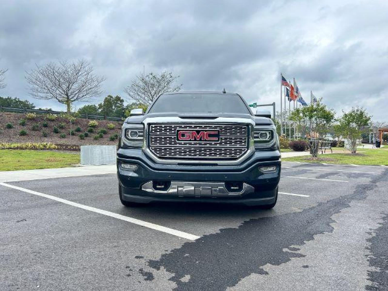 2017 Gray GMC Sierra 1500 Denali Crew Cab Long Box 4WD (3GTU2PEJ4HG) with an 6.2L V8 OHV 16V engine, 6-Speed Automatic transmission, located at 1806 Veterans Memorial Hwy SW, Austell, GA, 30168, (770) 944-9558, 33.817959, -84.606987 - Photo #1