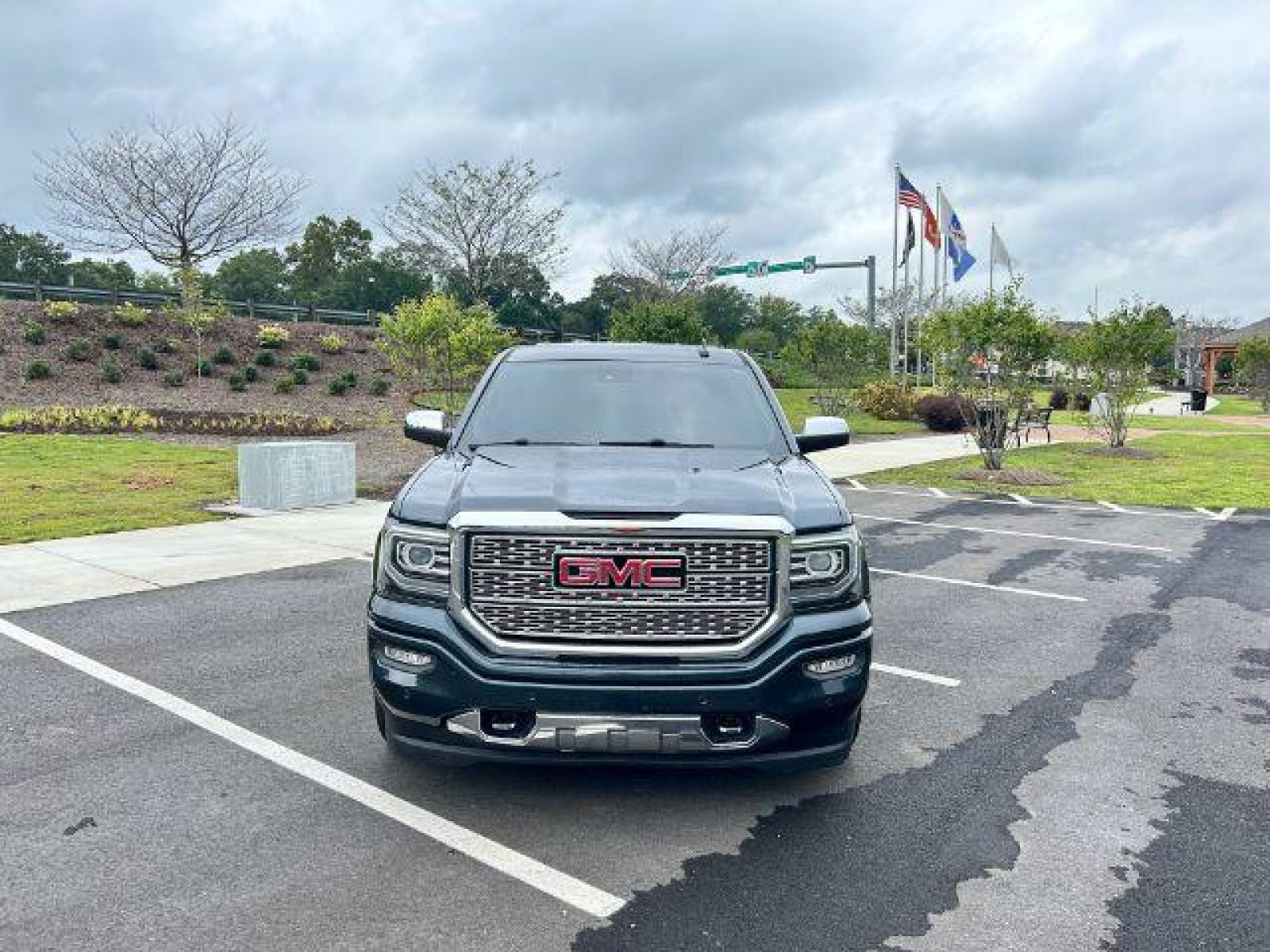 2017 Gray GMC Sierra 1500 Denali Crew Cab Long Box 4WD (3GTU2PEJ4HG) with an 6.2L V8 OHV 16V engine, 6-Speed Automatic transmission, located at 1806 Veterans Memorial Hwy SW, Austell, GA, 30168, (770) 944-9558, 33.817959, -84.606987 - Photo #2