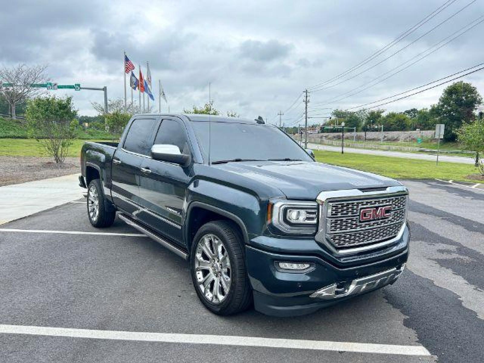 2017 Gray GMC Sierra 1500 Denali Crew Cab Long Box 4WD (3GTU2PEJ4HG) with an 6.2L V8 OHV 16V engine, 6-Speed Automatic transmission, located at 1806 Veterans Memorial Hwy SW, Austell, GA, 30168, (770) 944-9558, 33.817959, -84.606987 - Photo #4