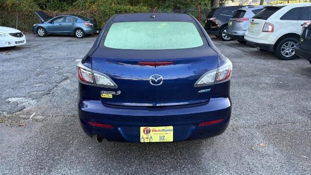 2012 Blue Mazda MAZDA3 I Grand Touring 4-Door (JM1BL1W76C1) with an 2.0L L4 DOHC 16V engine, located at 1806 Veterans Memorial Hwy SW, Austell, GA, 30168, (770) 944-9558, 33.817959, -84.606987- Photo#1