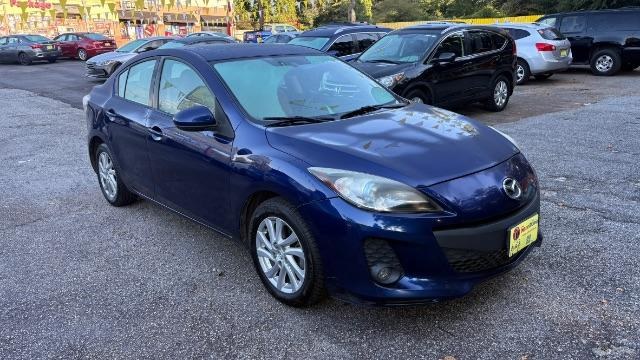 2012 Blue Mazda MAZDA3 I Grand Touring 4-Door (JM1BL1W76C1) with an 2.0L L4 DOHC 16V engine, located at 1806 Veterans Memorial Hwy SW, Austell, GA, 30168, (770) 944-9558, 33.817959, -84.606987- Photo#2
