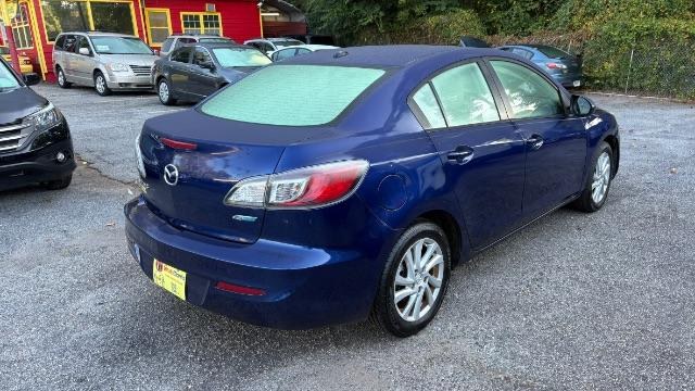 2012 Blue Mazda MAZDA3 I Grand Touring 4-Door (JM1BL1W76C1) with an 2.0L L4 DOHC 16V engine, located at 1806 Veterans Memorial Hwy SW, Austell, GA, 30168, (770) 944-9558, 33.817959, -84.606987- Photo#4