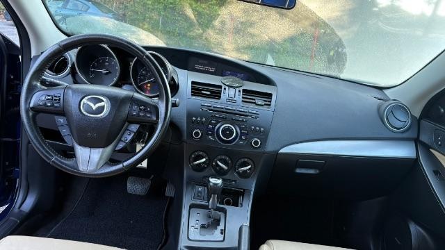 2012 Blue Mazda MAZDA3 I Grand Touring 4-Door (JM1BL1W76C1) with an 2.0L L4 DOHC 16V engine, located at 1806 Veterans Memorial Hwy SW, Austell, GA, 30168, (770) 944-9558, 33.817959, -84.606987- Photo#8